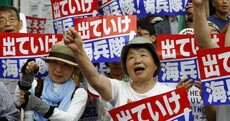 Thousands rally at US military base in Japan after alleged rape and murder of young woman
