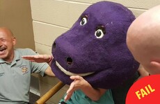 This teenager hilariously got herself stuck in a giant Barney the Dinosaur head