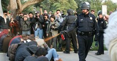 Two officers suspended over pepper-spraying of peaceful protesters