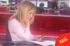A BBC newsreader was caught texting at the desk but totally styled it out