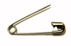 Thousands of Britons have pledged to combat racism by wearing a safety pin