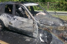 Heavy delays on M50 after car goes on fire