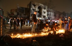 Iraq president vows to "punish" attackers who killed 119 in suicide blasts