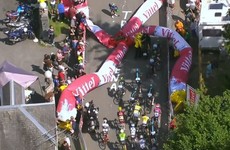 Giant inflatable arch collapses and causes havoc at Tour de France