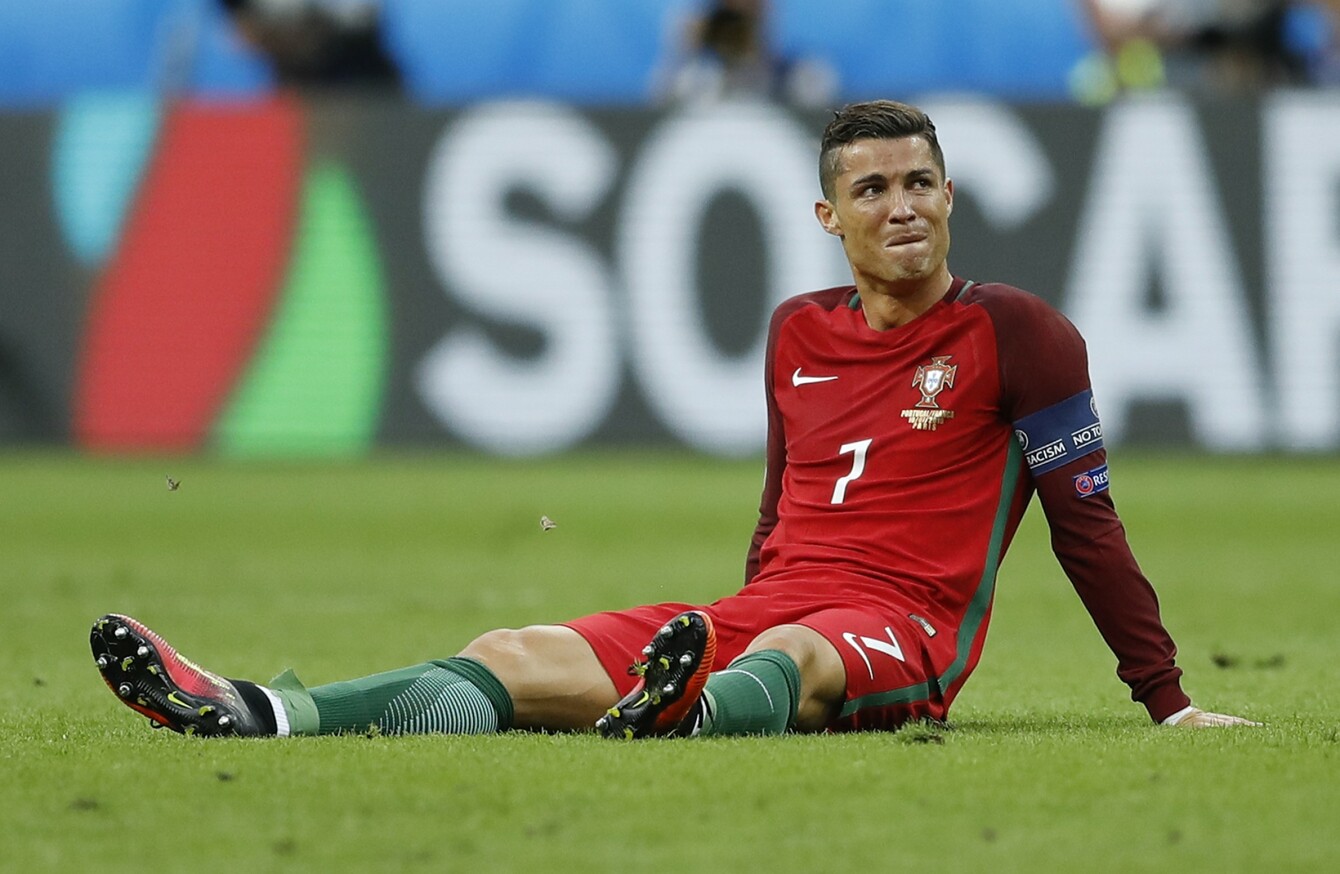 Tearful Cristiano Ronaldo stretchered off during Euro 2016 ...