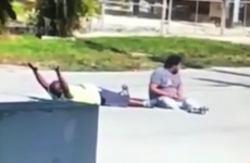 Police shoot unarmed man as he lies on the ground with his hands up