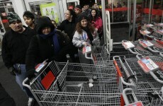 Woman who allegedly pepper-sprayed Black Friday crowd surrenders