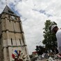 Cousin of teenager who killed French priest charged with terrorism