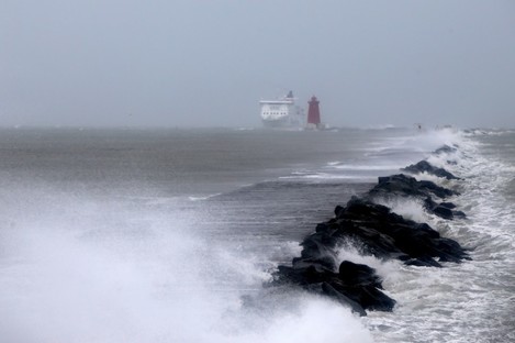 High waves hit the Poolbeg South Wall in Dublin. 
