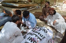 At least 70 mourners killed in 'appalling' bomb blast at hospital in Pakistan