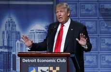 Trump announces changes to tax plan as protesters are removed from venue