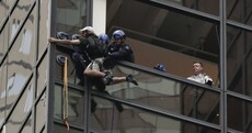 Dramatic footage shows man who climbed Trump Tower being hauled in window