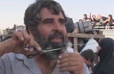 Civilians celebrate in the streets as Islamic State is pushed out of Syrian city