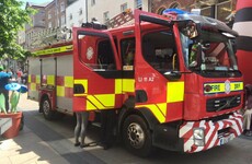 Young people throw rocks at firefighters as they attend bonfire in Limerick