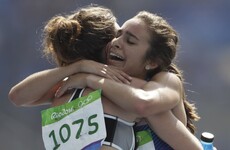 Two runners put medal hopes on hold to help each other finish race after ugly fall
