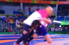 An Olympic wrestler celebrated winning gold by casually body-slamming her coach