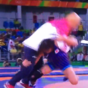 An Olympic wrestler celebrated winning gold by casually body-slamming her coach