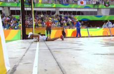 41-year-old runner slips on Olympic marathon finish line...but saves himself by doing push-ups