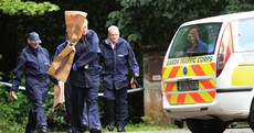 Gardaí remove items of evidence from Philip Finnegan crime scene