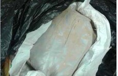 Woman in her late 40s arrested after bag of heroin seized in raid