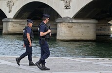French police officer stabbed as authorities foil attack by three women