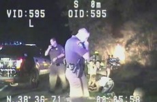 Watch: Police save babies from burning car in dramatic rescue