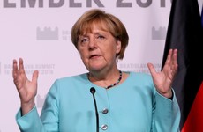 Angela Merkel's party suffers bruising loss in Berlin elections as far-right party gains