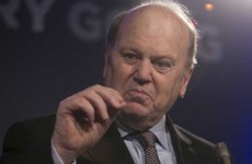 Fianna Fáil and Fine Gael are rowing over whether Michael Noonan should go before the Public Accounts Committee