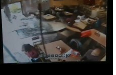 CCTV footage: Car crashes through front of California diner