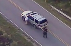 White police officer who fatally shot unarmed black man charged with first-degree manslaughter