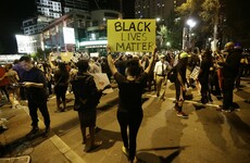 Video shows woman pleading with Charlotte police not to shoot her husband