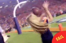 This poor woman got a football straight to the face on live TV