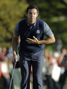 Rory McIlroy leads European comeback but US lead  5-3 after first day of Ryder Cup