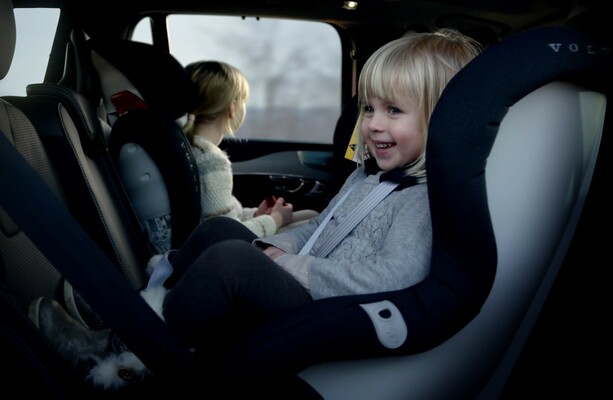 At what age can a kid outlet go in the front seat