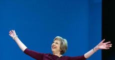 May directs Tories to the centre as she hits out at "nasty" Labour Party