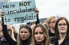 Polish government rows back on all-out abortion ban following mass protests