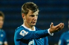 Andrey Arshavin shaves critical blogger's head bald