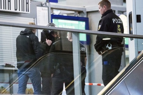 Police officers patrol the Central Station in the eastern city of Chemnitz. 