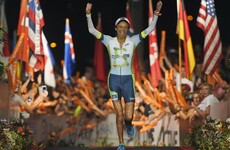 A burn victim who was told she'd never run again has completed the world's toughest triathlon