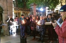 Silent candlelit vigil held outside Leinster House in memory of Carrickmines fire victims