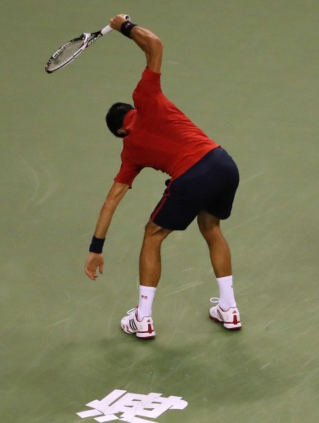 Raging Djokovic smashes racket and rips shirt en route to shock