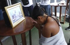 Woman forced to kneel before portrait of Thai king after 'posting disrespectful comments online'