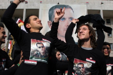 Assad supporters gathered in Damascus on Friday.
