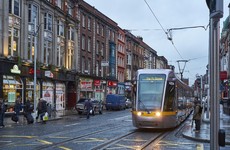 Woman who tried to jab Luas driver in the eye with broken bottle has jail term cut on appeal