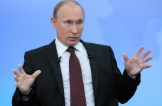 Putin mocks opposition but accepts 'lawful' protests on TV phone-in