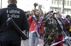 EU and Canada sign free-trade pact to the backdrop of red-paint protests