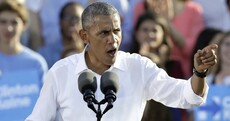 Obama warns voters the fate of the world is at stake in US election