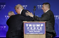 Donald Trump bundled off the stage at rally over gun scare