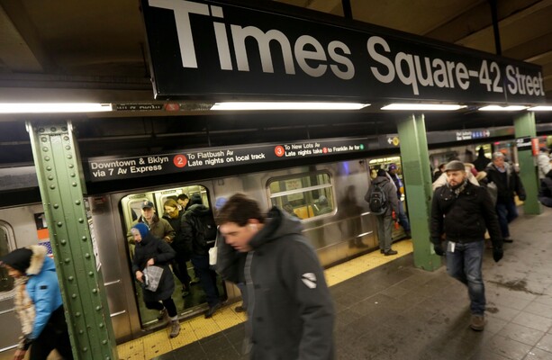 Woman killed after being pushed in front of subway train at Times ...