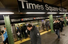 Woman killed after being pushed in front of subway train at Times Square station